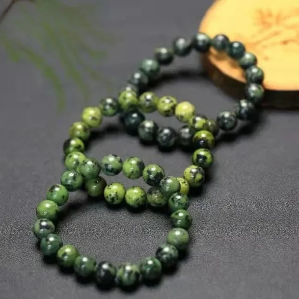 Hand‑Carved Natural Green Jade Bracelet