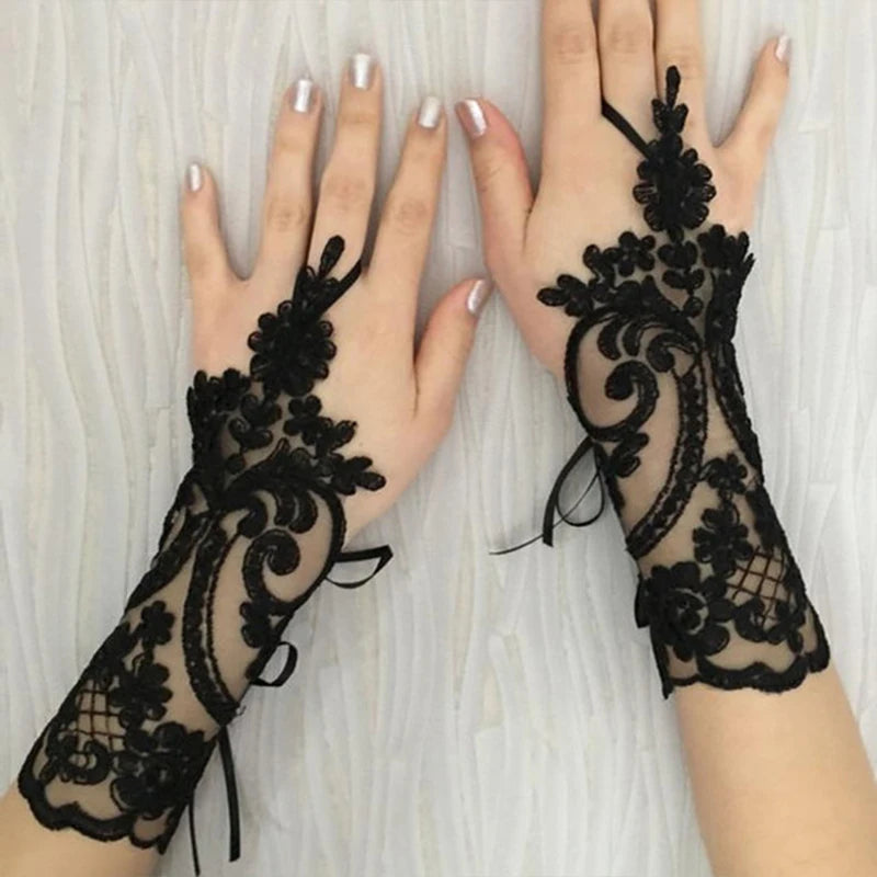Lace Gloves in White or Black. Fingerless.  A Great Addition to that Special Occasion.
