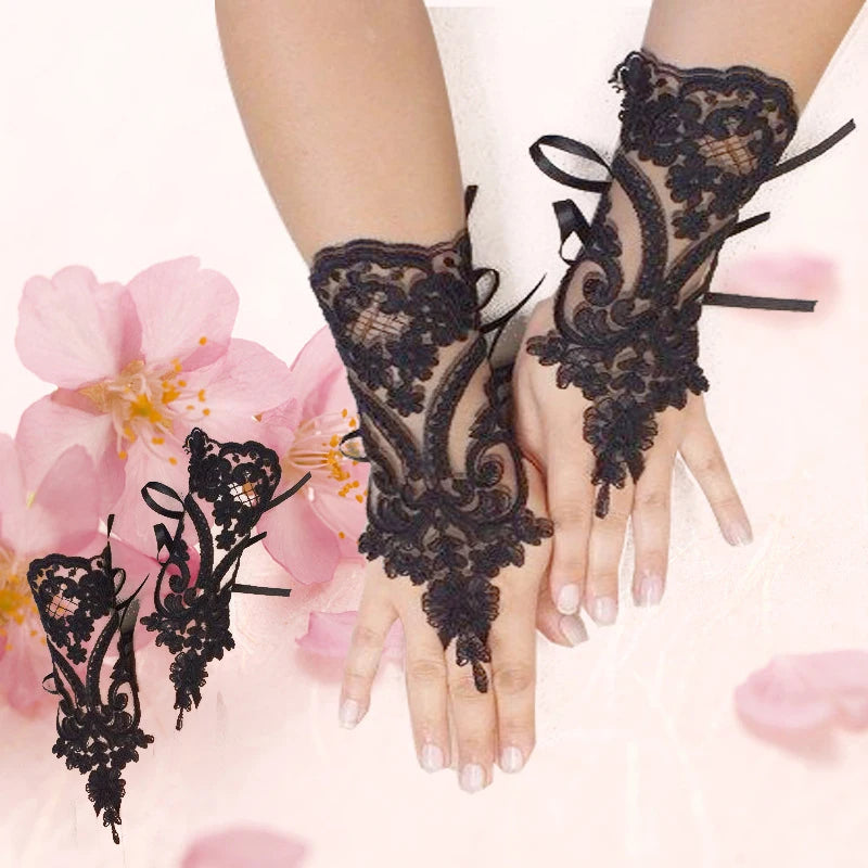 Lace Gloves in White or Black. Fingerless.  A Great Addition to that Special Occasion.
