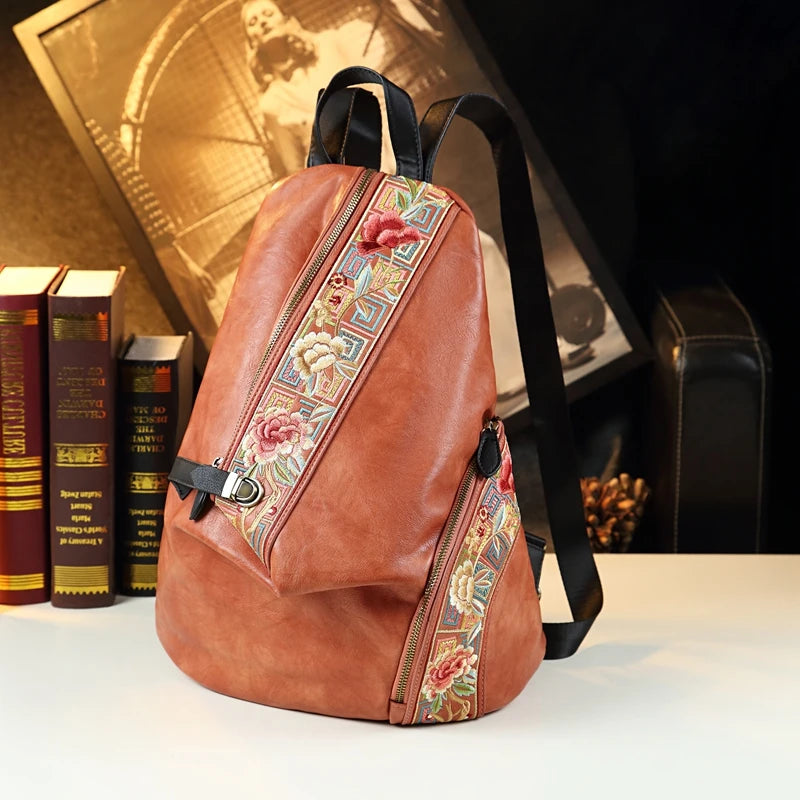 Retro Style Shoulder Backpack.  Made with Genuine Leather.  Trendy Embroidered Design.  Multiple Colors