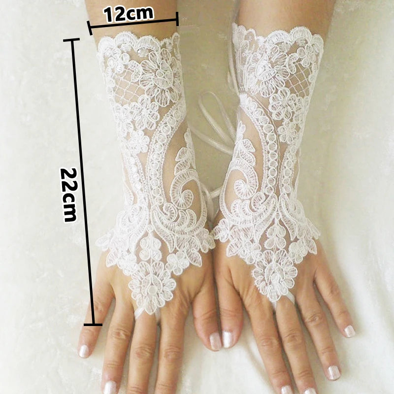 Lace Gloves in White or Black. Fingerless.  A Great Addition to that Special Occasion.