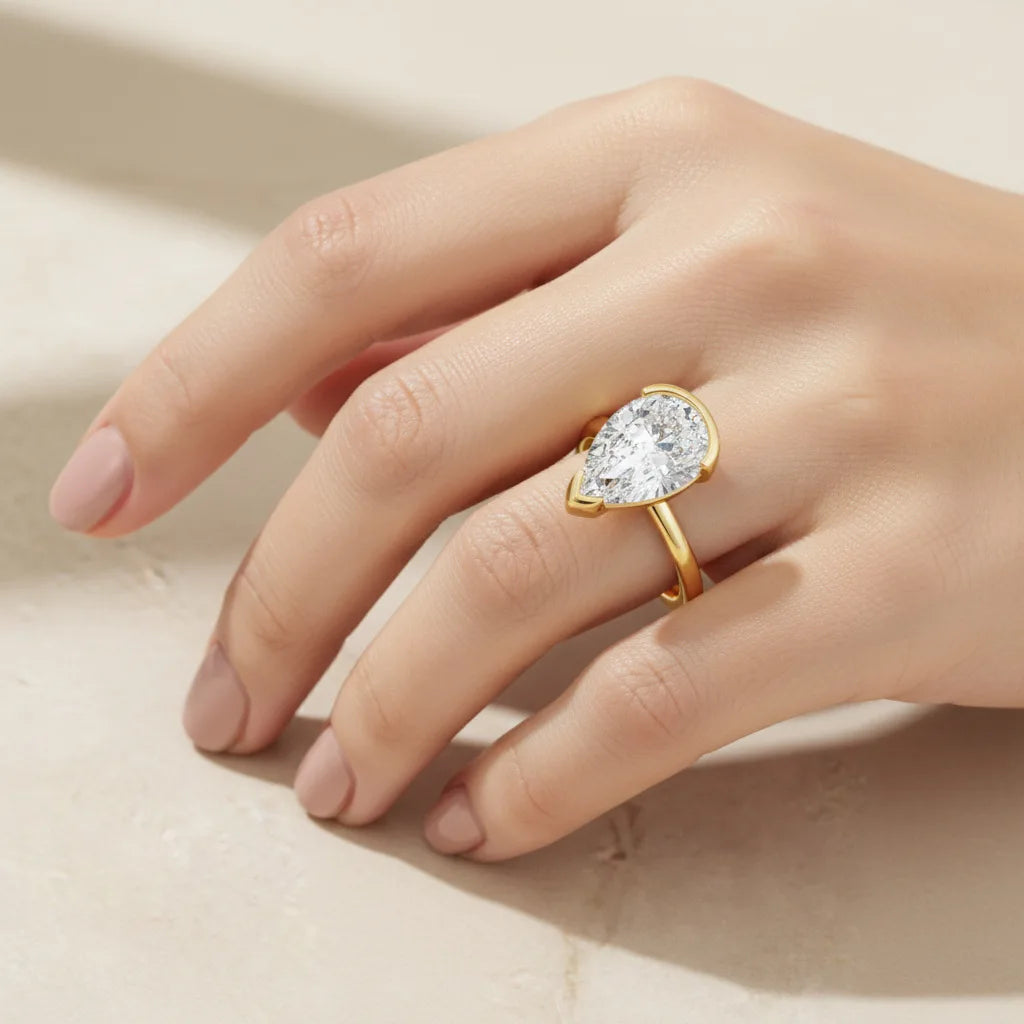 Pear‑Shaped 4ct Moissanite Ring.  Timeless Sparkle