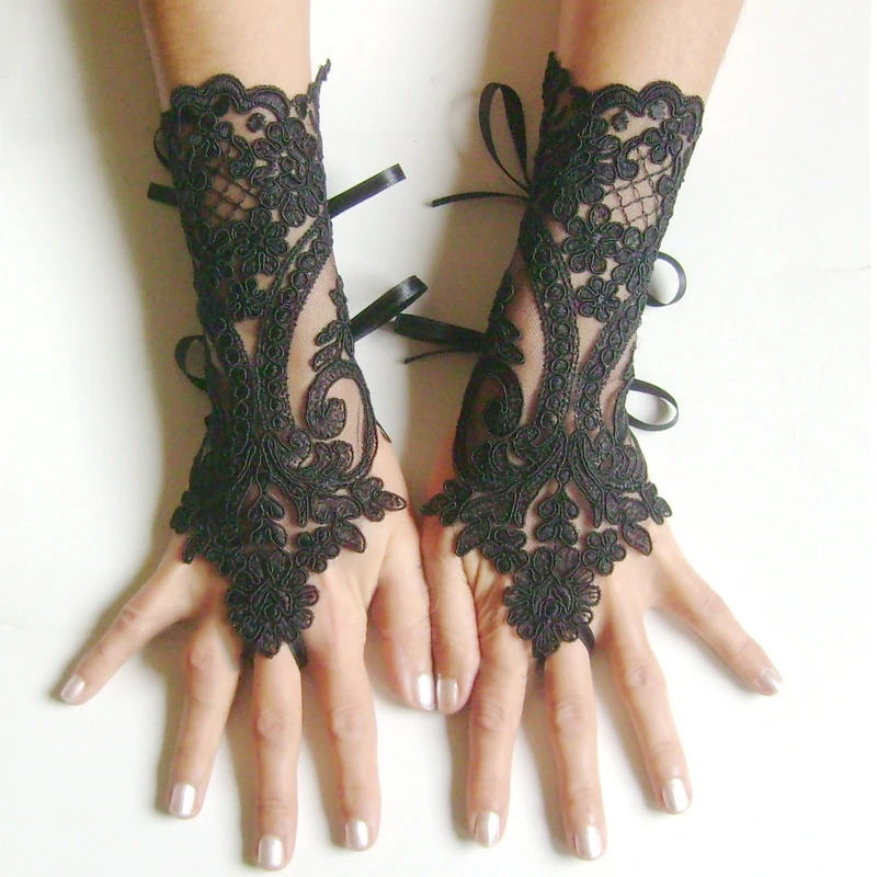 Lace Gloves in White or Black. Fingerless.  A Great Addition to that Special Occasion.
